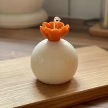 Charger l'image dans la galerie, Orange sphere candle on wood