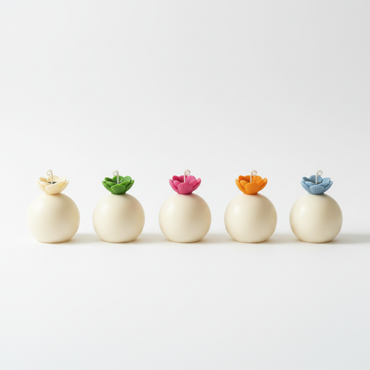 Sphere candles minimal flat lay - green with black heart